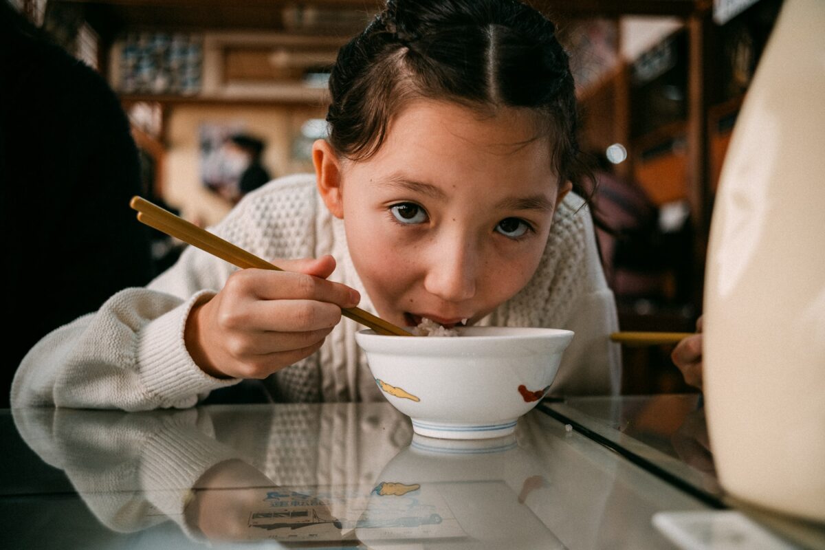 Kalina eating rice bowl
