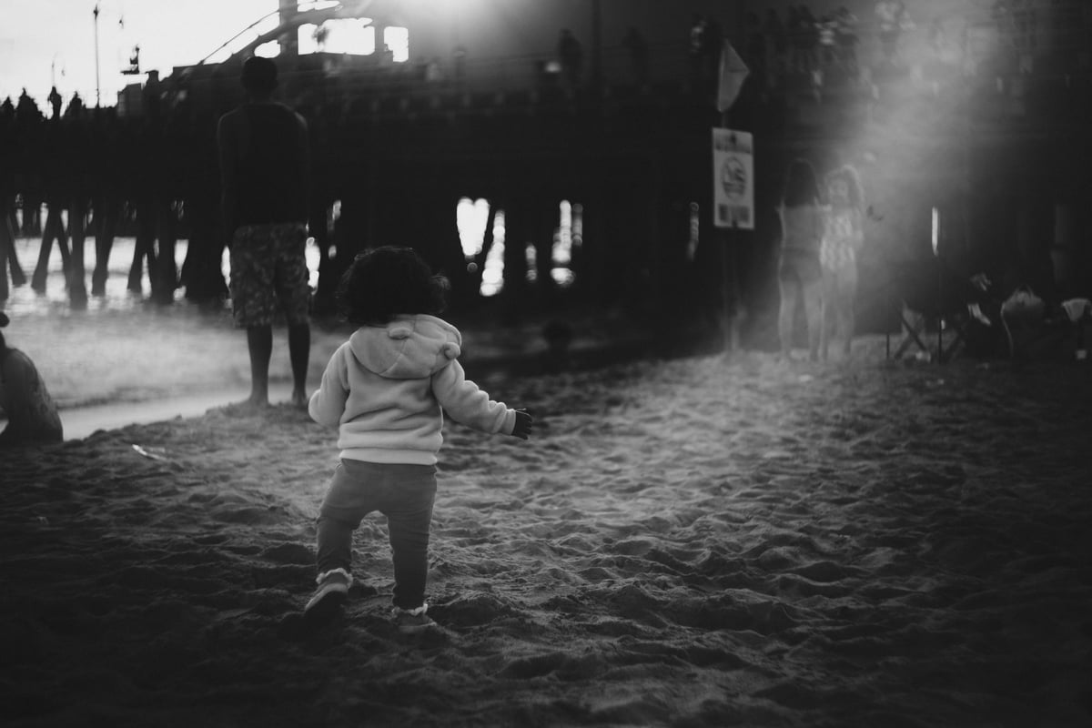 girl plays on Santa Monica Beach