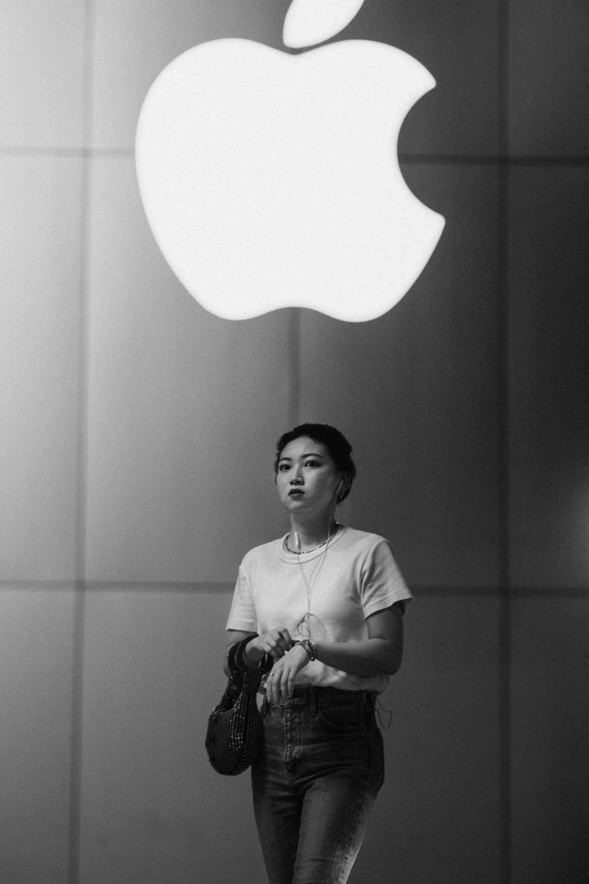 Girl in front of Apple Logo