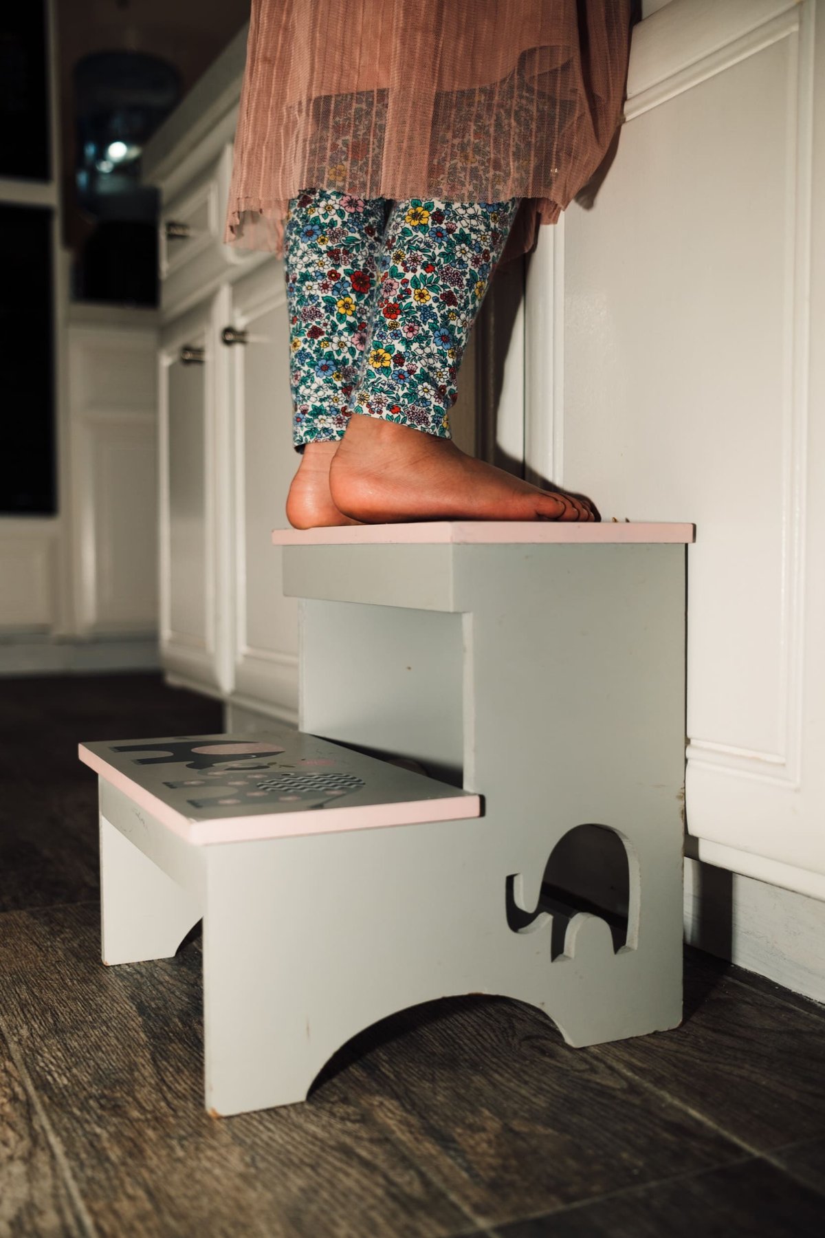 Lifestyle photo feet up on a bench.