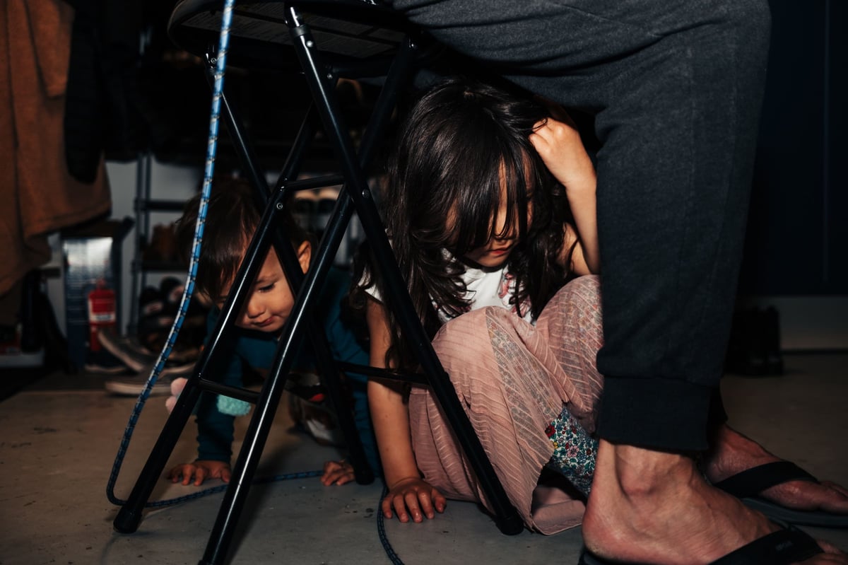 Niece playing with uncle.