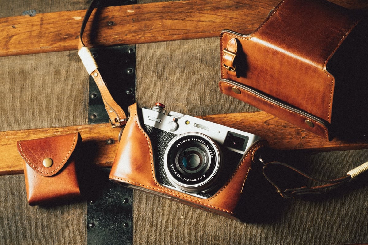 Product shot of the Kaza Deluxe case and strap kit for the Fujifilm X100V