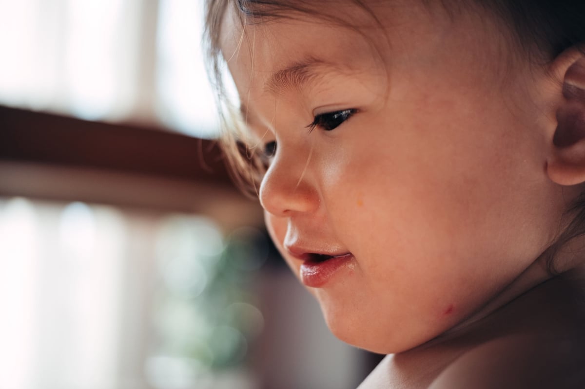 Little boy plays with toys