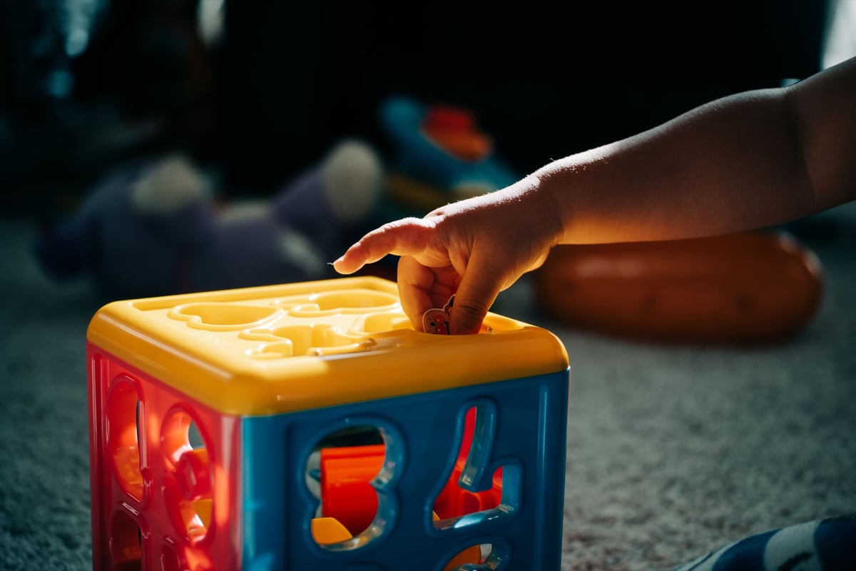 Pergear 35mm f1.6 Sample of Boy Playing with Toys