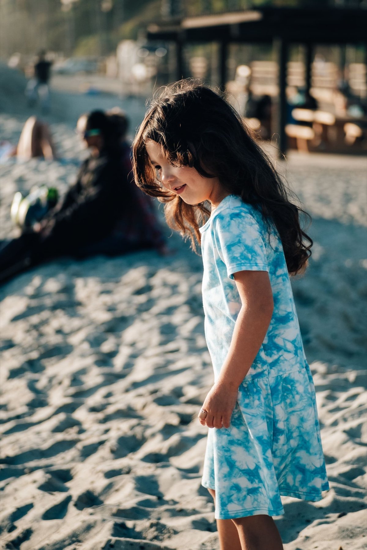 Bokeh Sample of Kalina playing at beach.