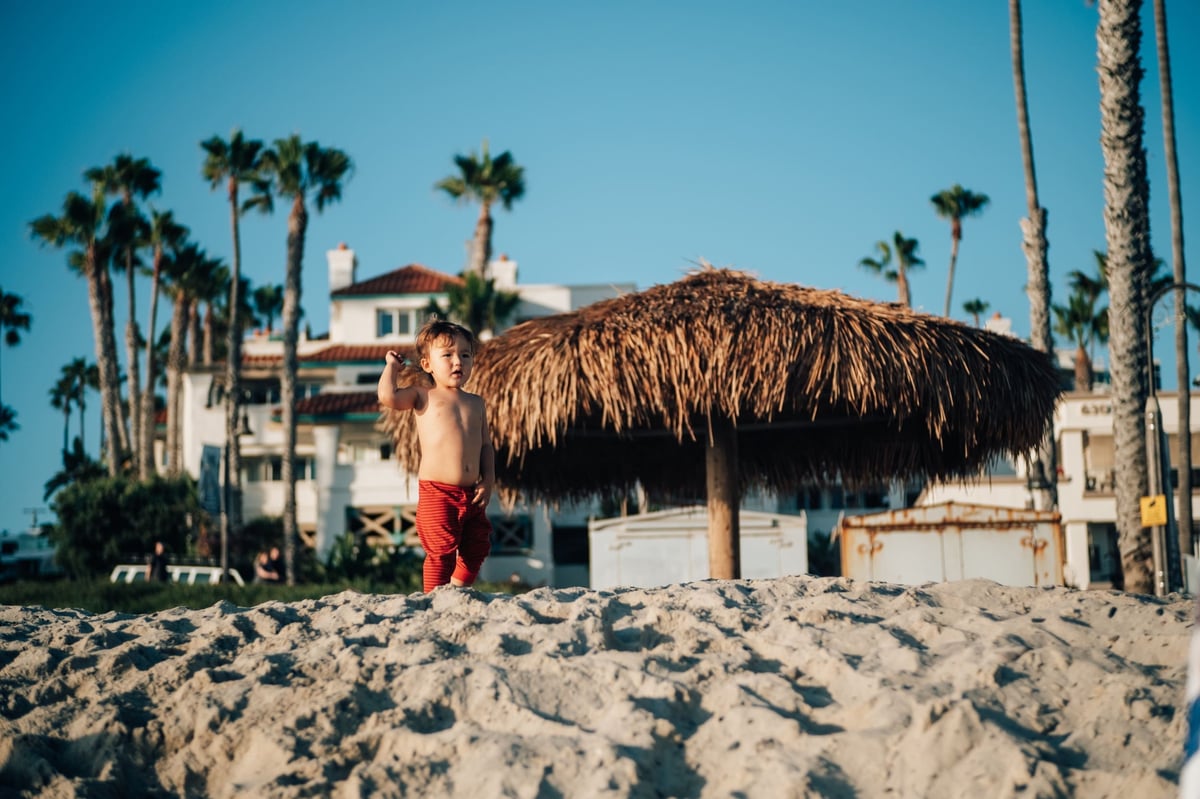 Luka plays at the beach