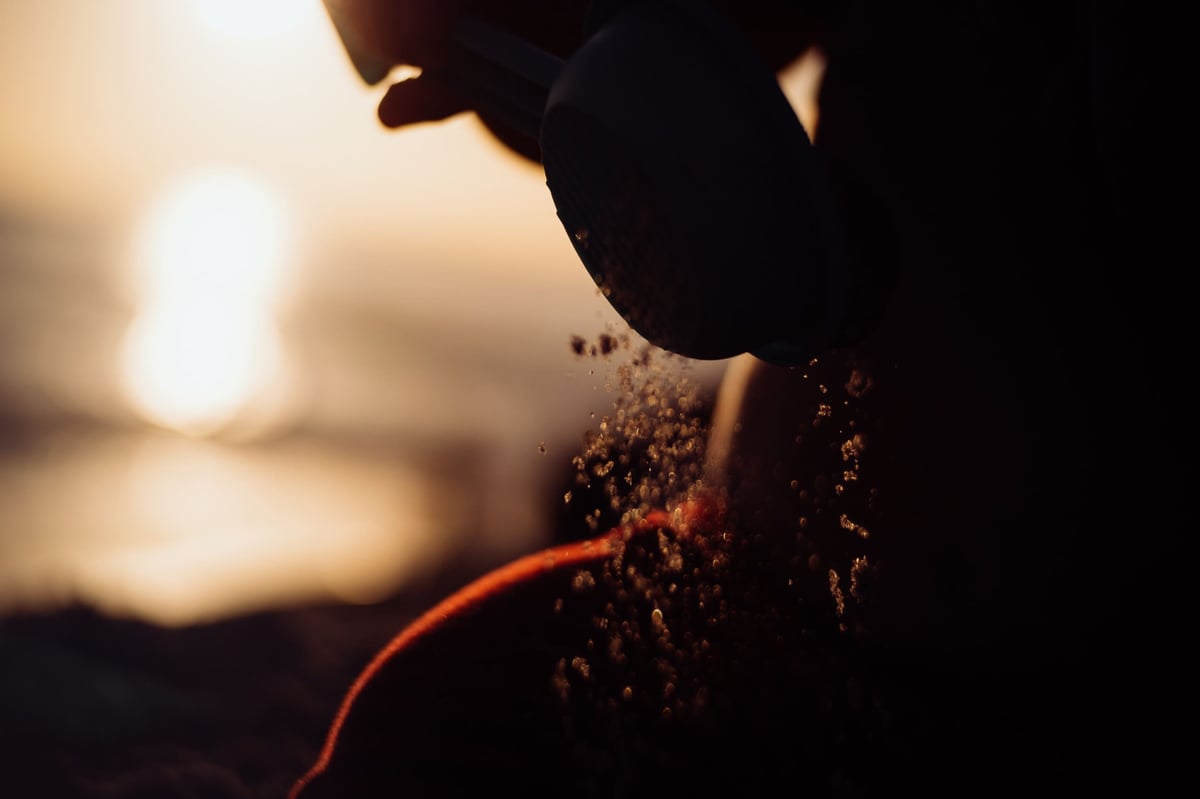Playing in sand backlit