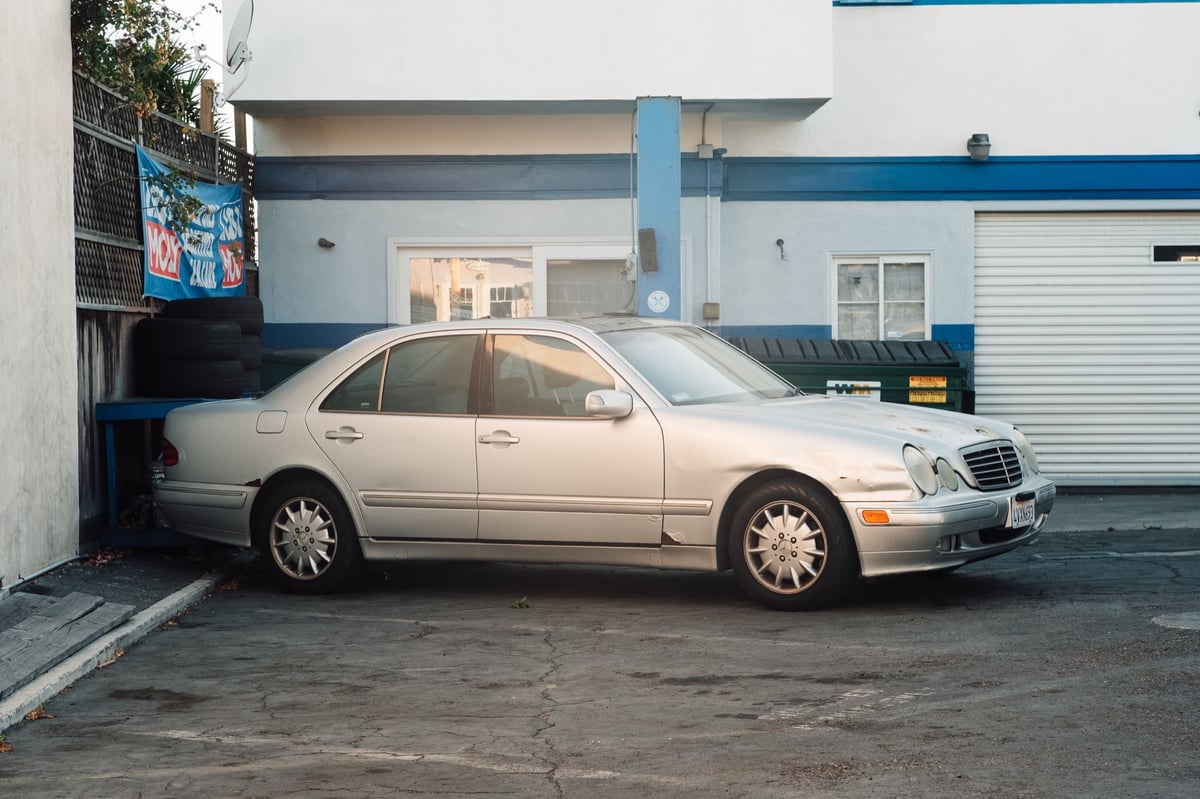 Old car at a dealership.