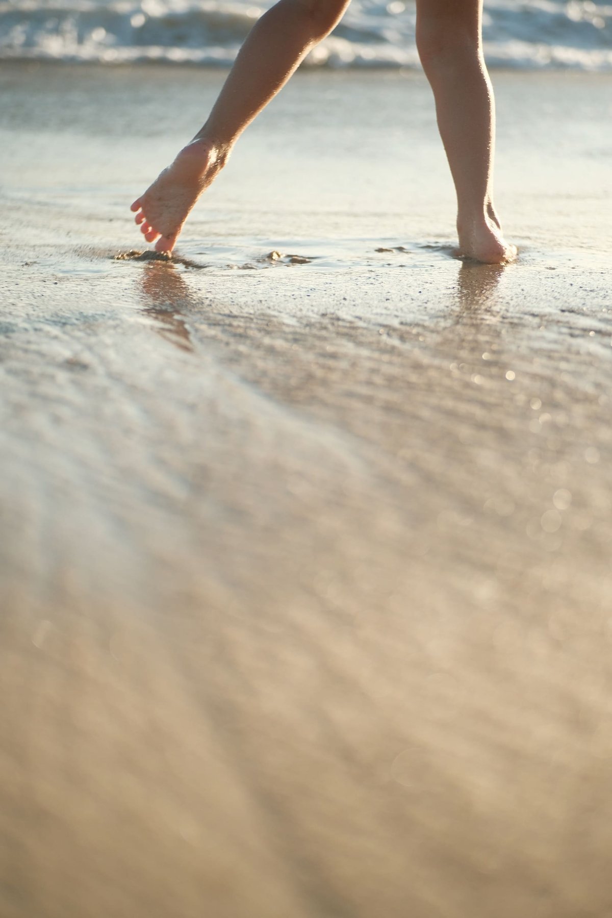 Feet in the sand