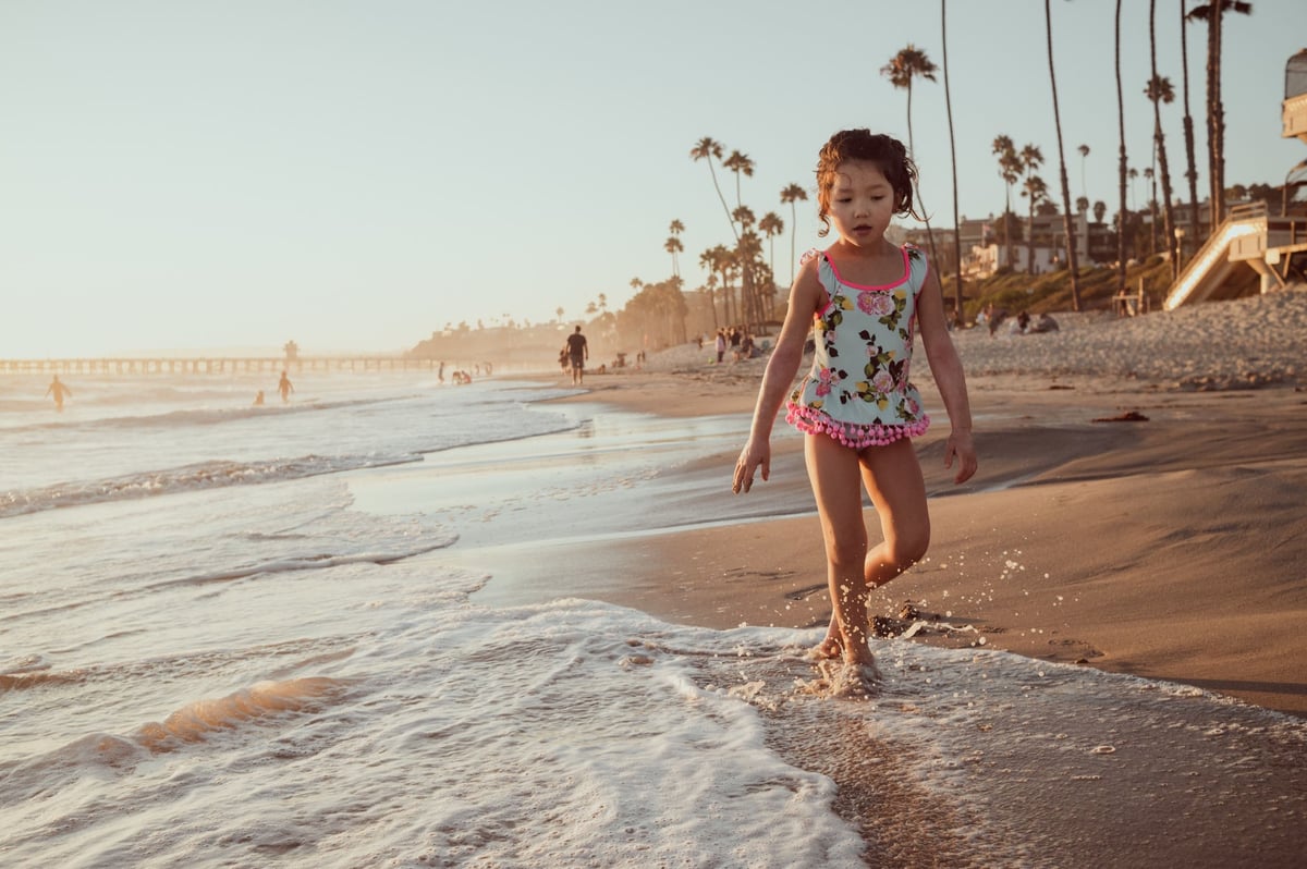 Lifestyle photo of little girl at T Street Beach