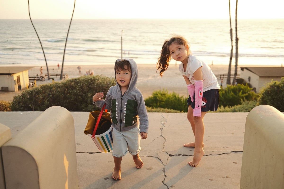 life style photo of kids hanging out at the beach