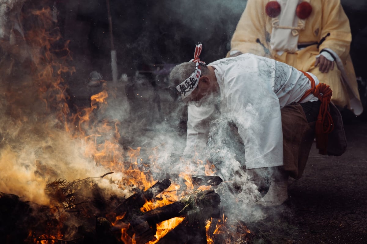 Monk working the flames