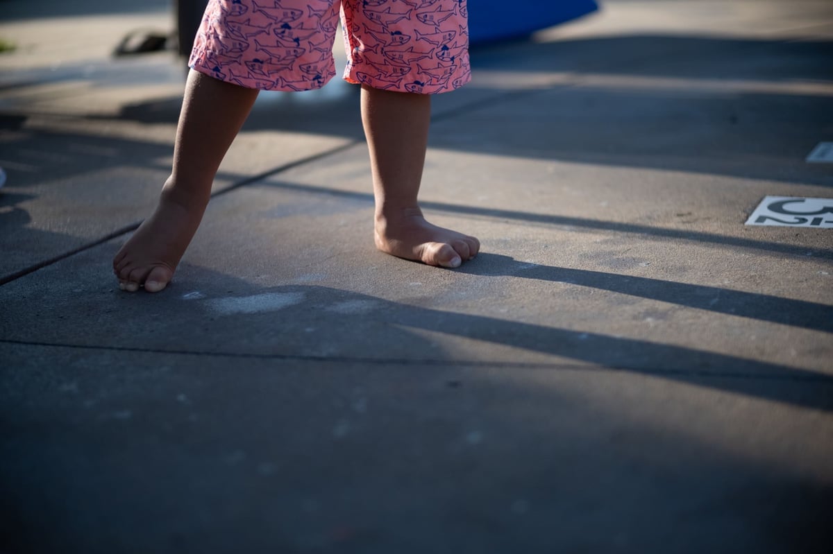 Boys feet making a shadow