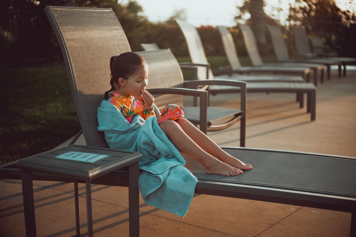 Kalina sitting at the pool