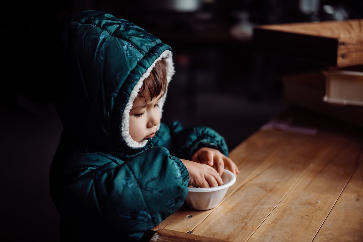 Boy eating food.