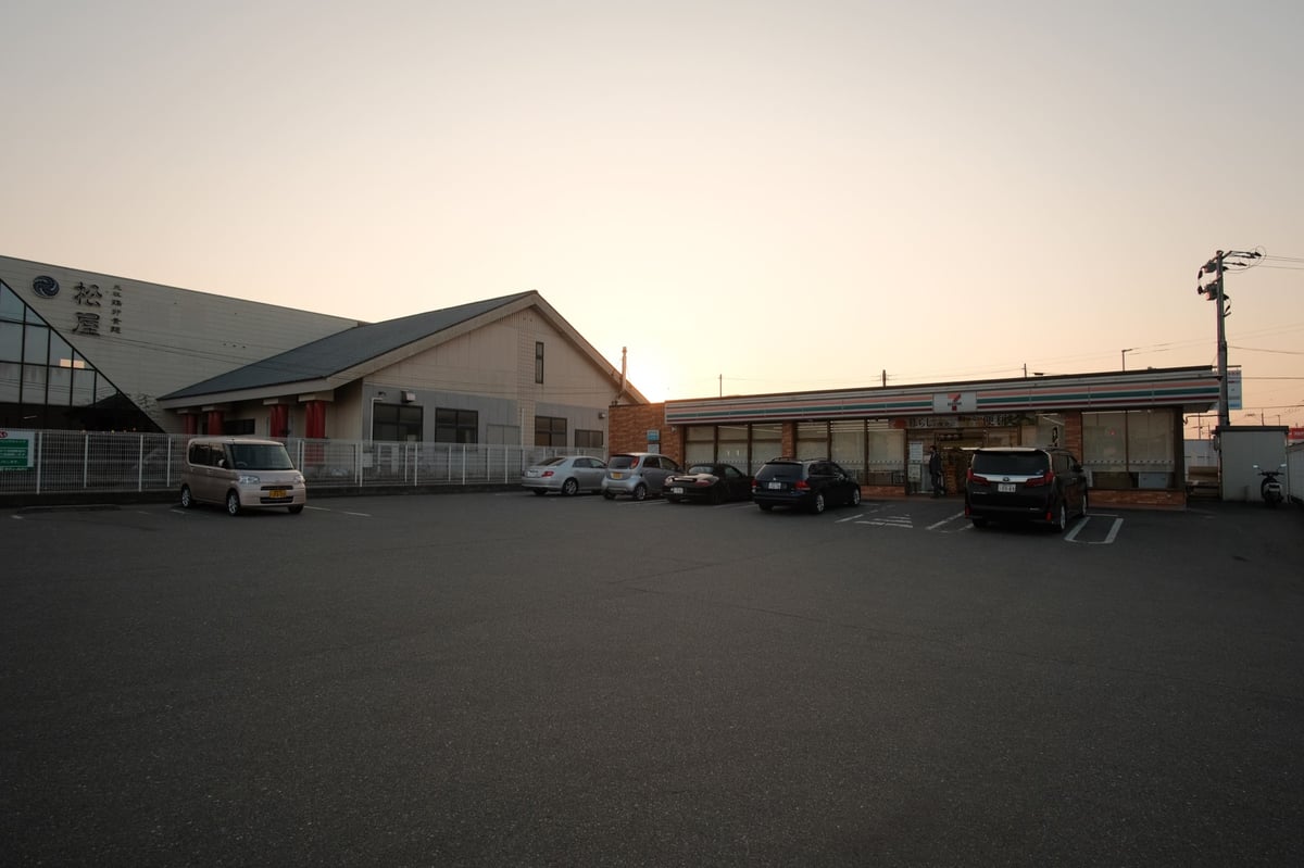 Rokinon 12mm f2 Sample Image of sun setting behind buildings