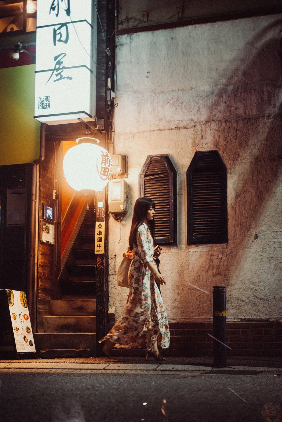 Japan street photo of a woman walking