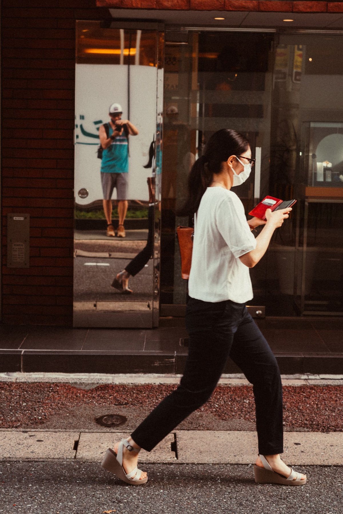 Japan street photos woman walking.