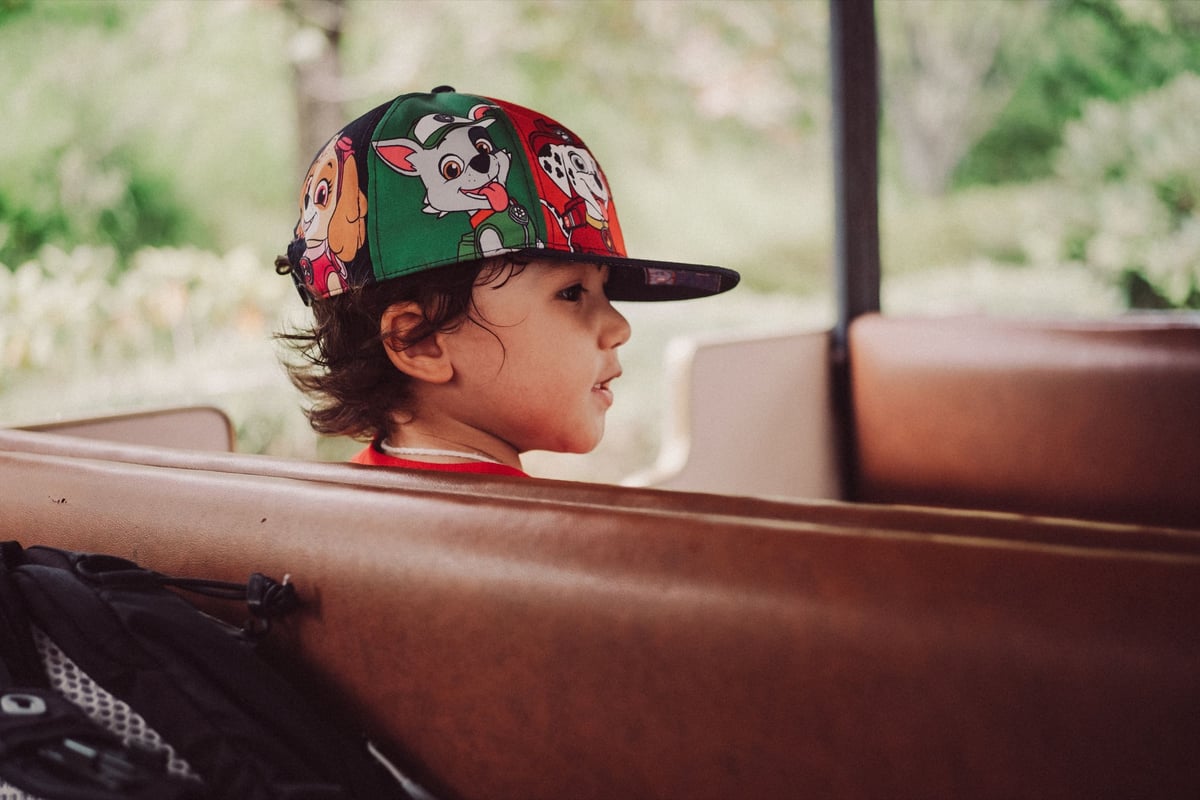 closeup of girl wearing hat.