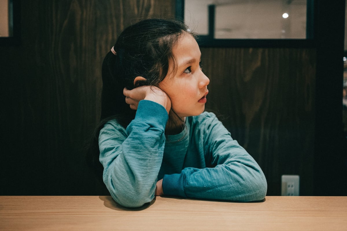 Kalina waiting for food at restaurant.