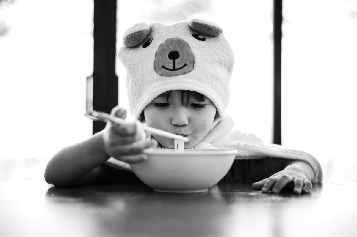 portrait of little boy in black and white