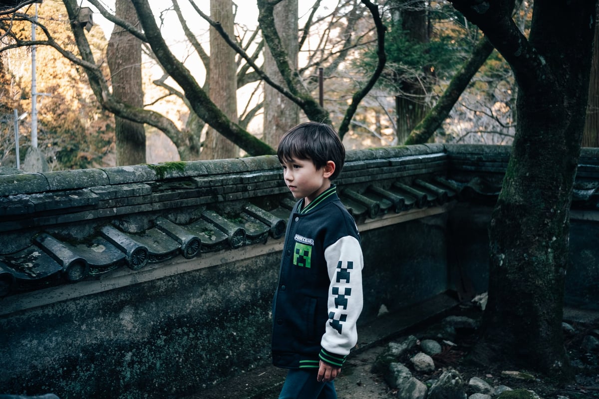 Luka standing in a temple