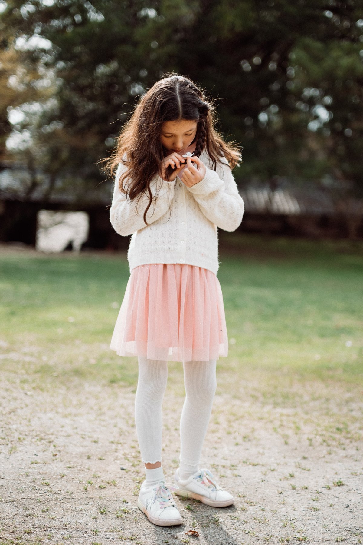 Kalina Portrait holding a flower