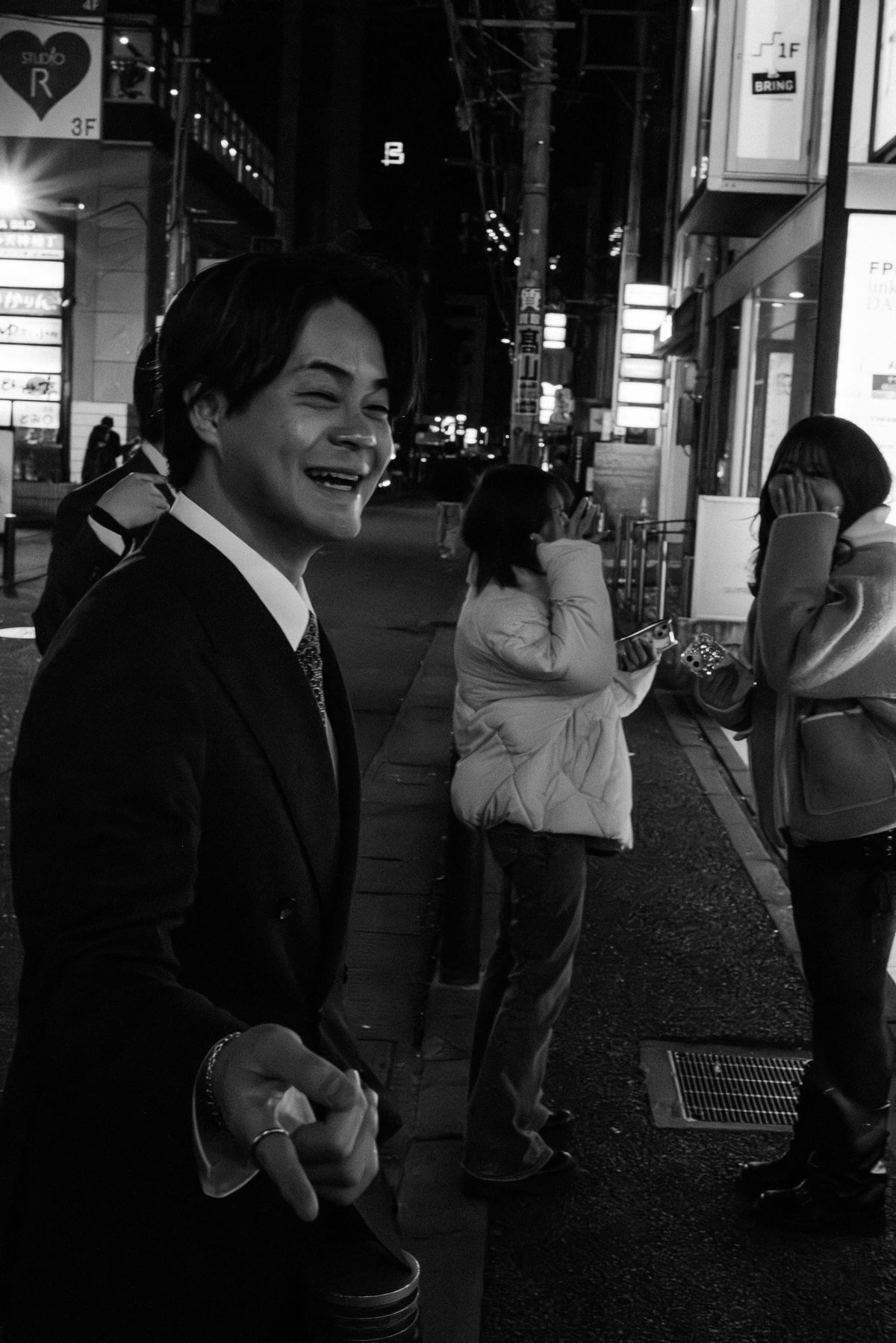 Some dudes on the streets of Fukuoka partying