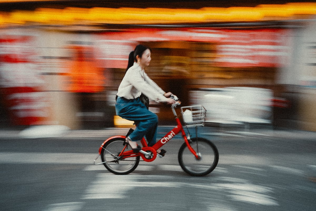 Slow shutter girl on bike