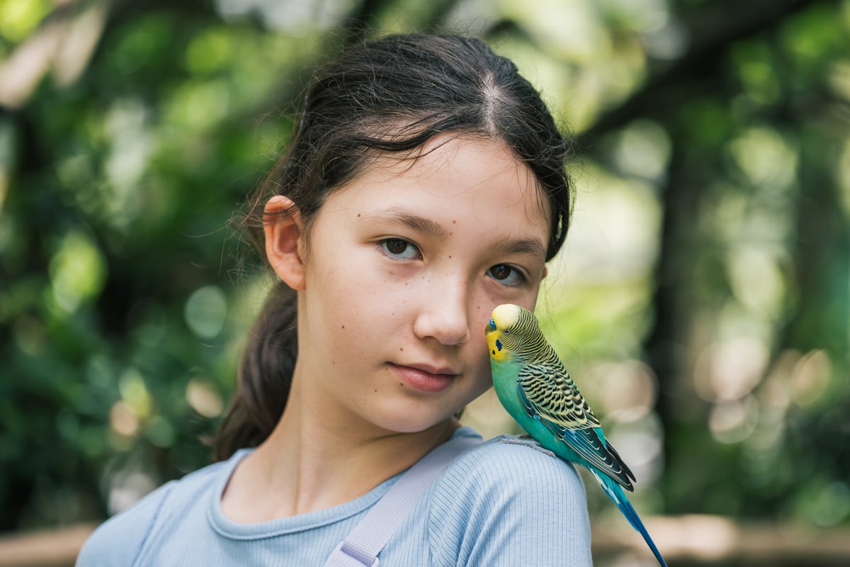 Portrait of Kalina posing with a bird