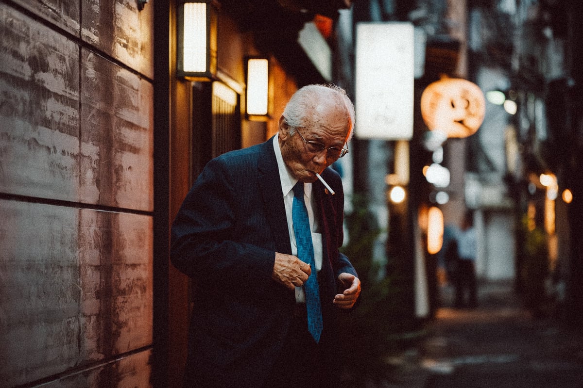 Street photography of man smoking